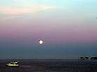 The moon rises over Old Harry  Studland United Nudists