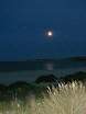 The moon rises over Old Harry  Studland United Nudists
